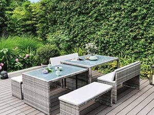 Table for 2, 4, 6 or 8? Welcome to the ultimate in flexible, extending outdoor dining. Pull out the spare table and ottoman stools until you have the combination you're catering for. Tuck them neatly away when finished. Snug as a bug. This striking storage set offers great value for money and offers a distinct difference from the many PVC rattan garden sets available. Featuring Two Tables, 2 Benches and 2 Ottomans / smaller seating benches, the versatility and function of this set will meet any need! Strong, sturdy powder coated steel frame wrapped with weather proof & UV stable poly rattan which will last for many, many years! 5cm Thick shower proof high quality polyester fabric cushions in a modern cool grey colour finish this stylish and distinctive look Cool grey coloured tempered safety glass table tops.